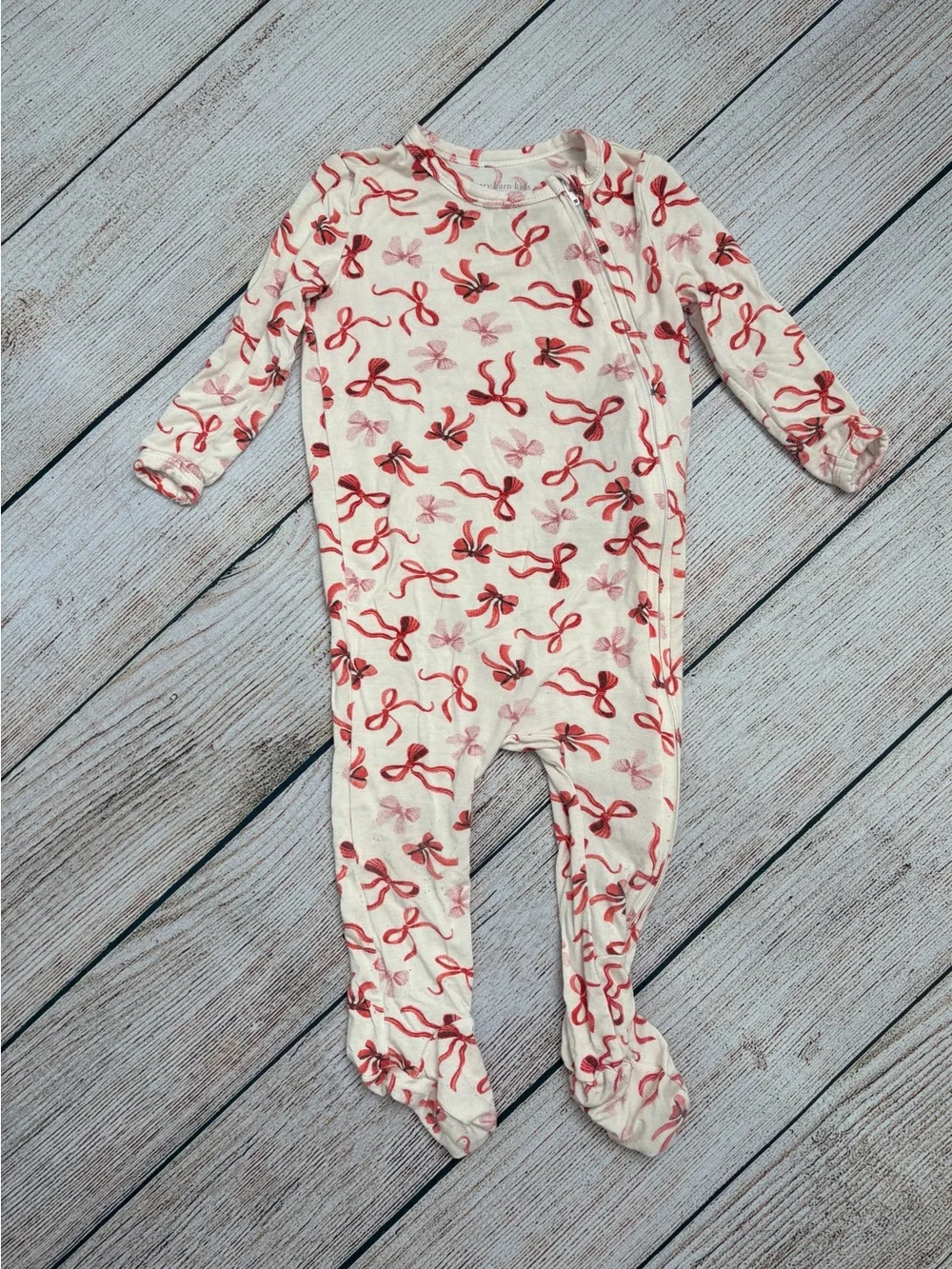 Pottery Barn Kids Long-Sleeve Footed One-Piece with Red Bow Print